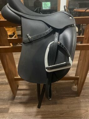 Black English Dressage Saddle with Stirrup Irons